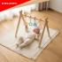 Koka izglītojošais statīvs KRUZZEL Baby Gym, 4 riņķīši, 0+, 64 x 43 x 52 cm