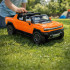Tālvadības automašīna Hummer EV oranžā krāsā Rastar 93000 1:16
