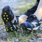 Pretslīdes kurpju uzlikas ar metāla tapām