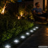 Zemē ievietojamu dārza saules lampu komplekts ar krēslas sensoru – 8 LED, 4 gab.
