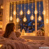 Ziemassvētku LED gaismas aizkars ar 12 caurspīdīgām bumbām, silti balta gaisma, IP44, 138 LED, 460cm