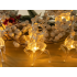 Ziemassvētku LED gaismas virtene ar mirdzošiem ziemeļbriežiem, 10 LED