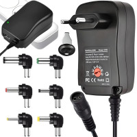 Universāls regulējams barošanas adapteris ar maināmiem DC uzgaļiem, 3–12 V